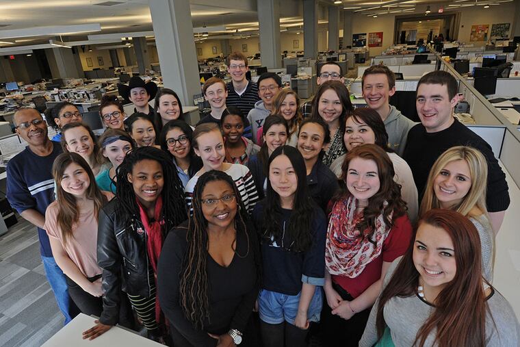 Workshop participants in The Inquirer newsroom, where they spent two weeks writing their news stories, with the help of staff volunteers.