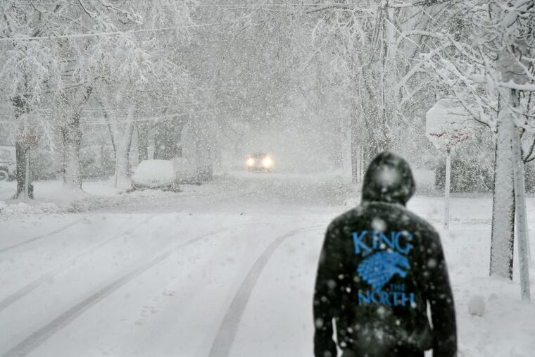 Cars and pedestrians move slowly in Haddonfield during last week’s nor’easter. Today’s isn’t nearly as bad.