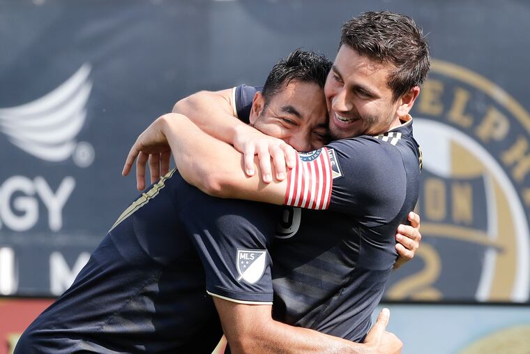 Marco Fabian (left) was one of many Union players who backed Alejandro Bedoya's protest against gun violence.