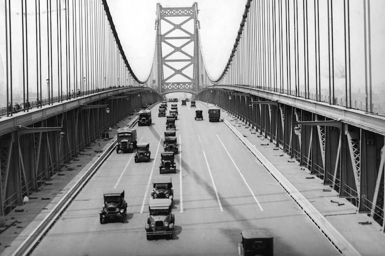 Cars cross the Delaware River Bridge in July 1926. The bridge was not named the Ben Franklin Bridge until the 1950s.