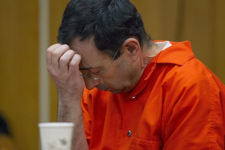 Larry Nassar appears for his sentencing at Eaton County (Mich.) Circuit Court in Charlotte on Wednesday, Jan. 31, 2018.