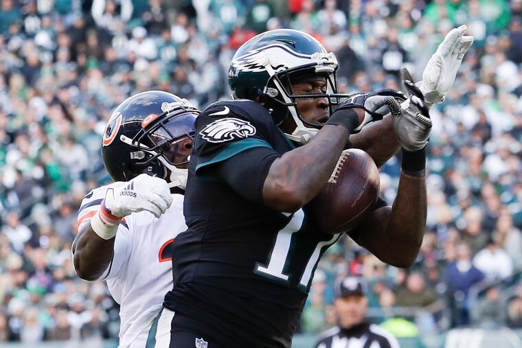 Eagles wide receiver Alshon Jeffery catches the football for a first down in the fourth quarter past Chicago Bears free safety Eddie Jackson on Sunday, November 3, 2019 in Philadelphia.