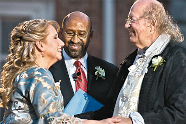 It’s wedding vows for Ben Franklin and Betsy Ross, as portrayed by Ralph Archbold and Linda Wilde. They were married at Independence Hall by Mayor Nutter. (John Costello / Inquirer)