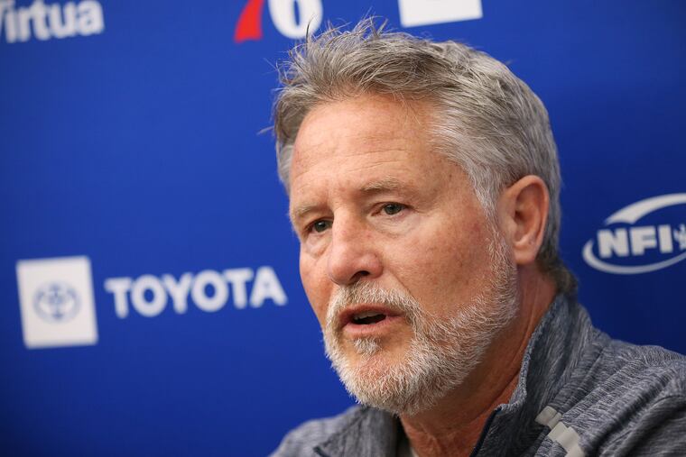 Brett Brown speaks to reporters during practice Thursday.