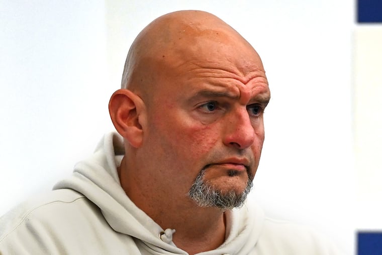 U.S. Sen. John Fetterman as President Biden greets volunteers at a campaign office in Roxborough July 7, 2024.