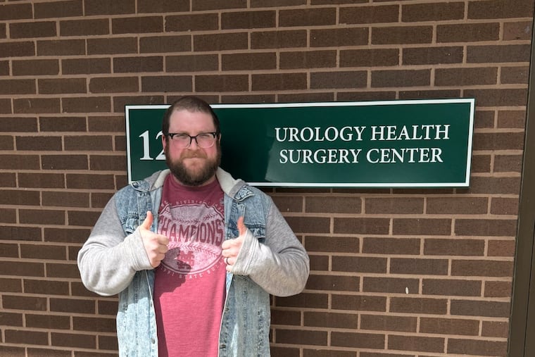 Justin Allen, of Horsham, poses outside the clinic where he was getting a vasectomy Friday morning when an earthquake shook the region.