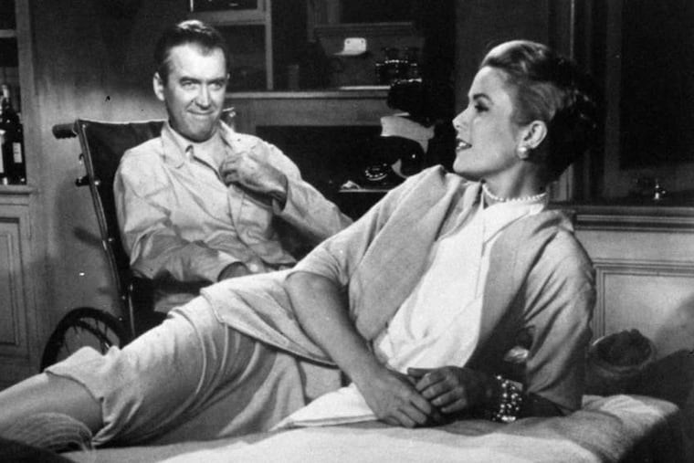With James Stewart in Alfred Hitchcock's "Rear Window," 1954. What a showcase for Kelly: As a ritzy high-fashion career girl, she displays her porcelain beauty; a sexiness restrained but hinting at something wilder; intelligence, perfect elocution, and a determined independence.