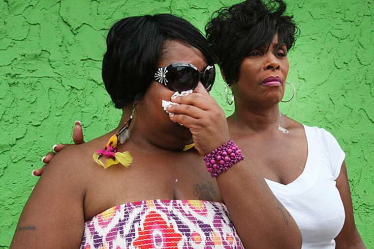 Yasin Harvey 's mother (left), Monique, and aunt, Debbie Anderson: Monique said she was pleased with the "verdict of justice." (Steven M. Falk/Staff)