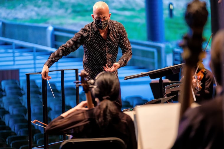 Yannick Nezet-Seguin conducts the Philadelphia Orchestra in a recent recording session at the Mann Center of works by Copland, Wagner, and Vivian Fung.
