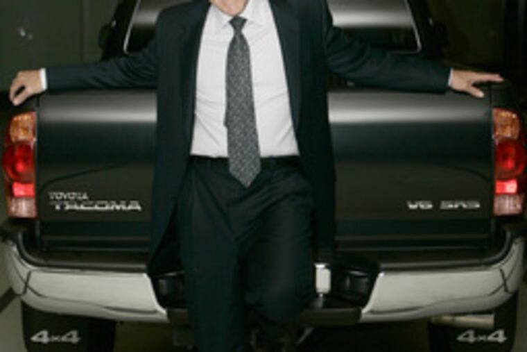 Jim Press posed last year with his Toyota Tacoma 4x4. Now, he will run Chrysler's sales and marketing operations.
