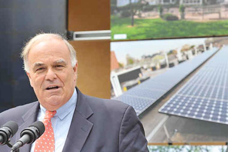 Gov. Rendell opens the door to applications for Sunshine solar-energy rebates of up to 35 percent during a ceremony yesterday at the Roxborough home of Charlie Bushka and Lynette Rundgren. (Sharon Gekoski / Staff Photographer)