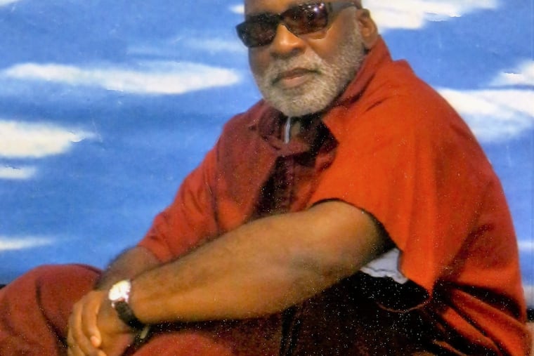 Dennis "Solo" McKeithan is seen in a photograph taken in prison.