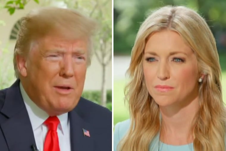 President Donald Trump speaks to Fox News host Ainsley Earhardt at the White House Wednesday afternoon after his former lawyer, Michael Cohen, implicated him in two campaign finance crimes.