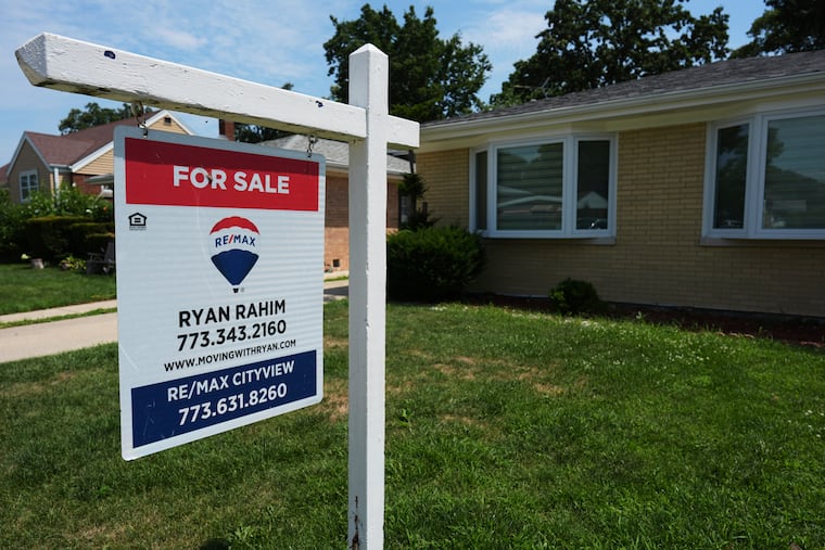 A For Sale sign is displayed in Skokie, Ill., July 24, 2025.