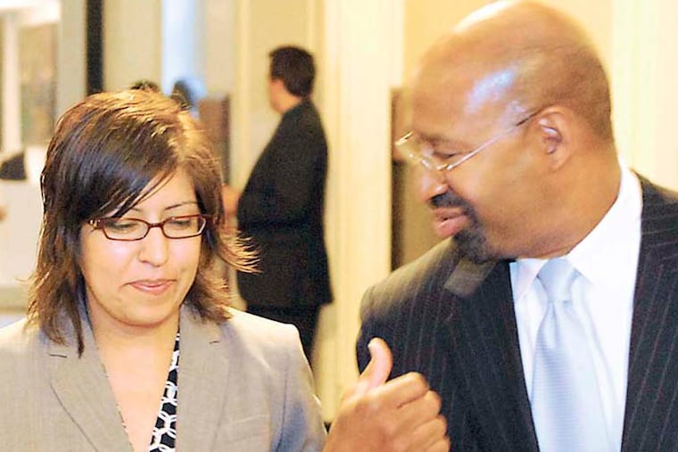 Mayor Michael Nutter walks to press conference with Gloria A. Casarez (left) where he announced her appointment as his liaison to the Lesbian, Gay, Bisexual and Transgender Communities Apr. 28, 2008. (Tom Gralish / Inquirer)
