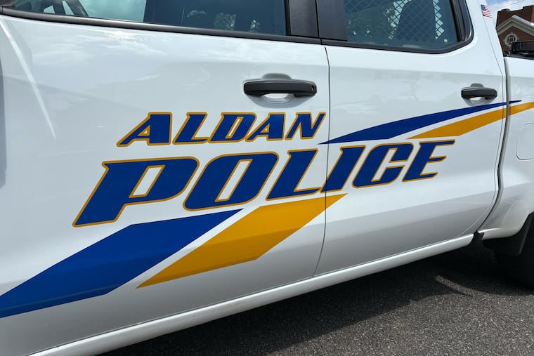 An Aldan Borough police vehicle is parked outside the police station.