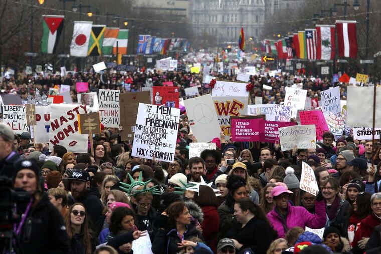 Thousands of protesters fill the Benjamin Franklin Parkway as they participate in a Women’s March Saturday Jan. 21, 2017 in Philadelphia. The march is being held in solidarity with similar events taking place in Washington and around the nation.