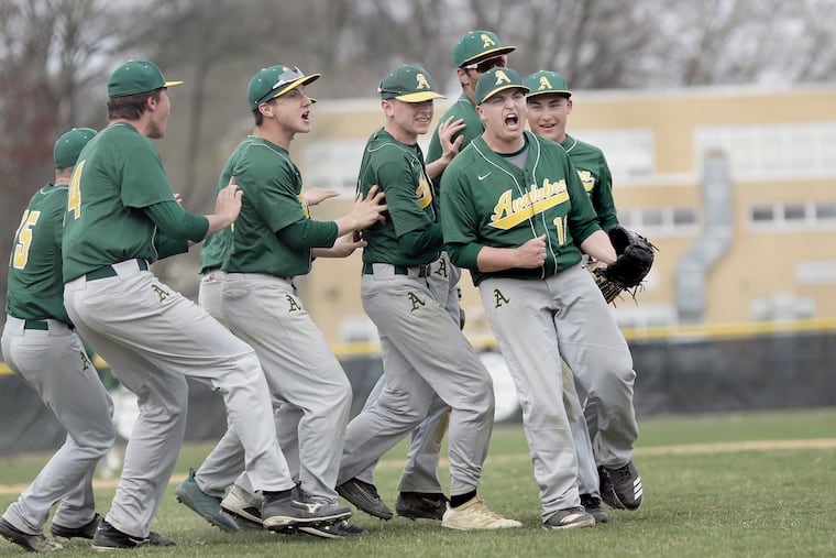 Audubon pitcher Joe Kidd (No. 16) is surrounded by celebrating teammates after the Green Wave beat Audubon, 4-2, in the final of the 24th annual Ralph Shaw Classic.