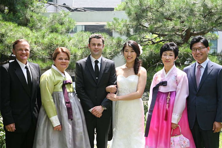 At the couple's first wedding, American-style, in Korea: (from left) his parents, Bill and Coleen Dunn; groom Patrick Dunn and bride Erica Park; and her parents, Gui Hye Park and Hyeon Cheol Park. The couple held their second wedding a few months later in Exton. (Cosa Wedding)