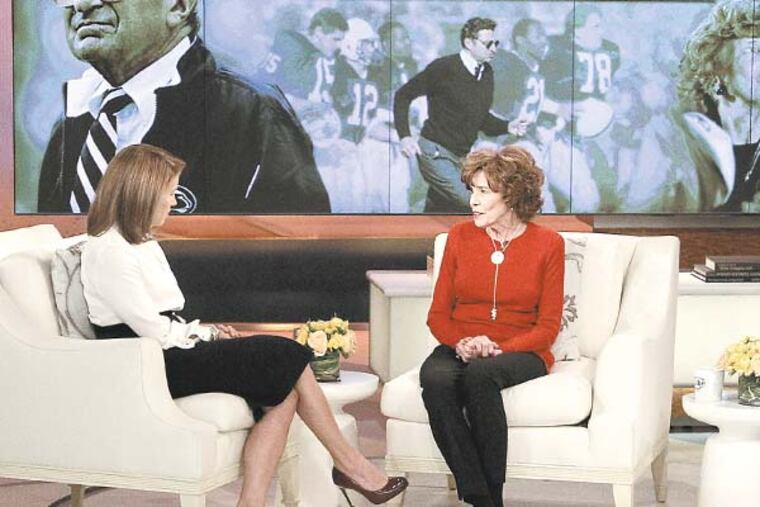 This Feb. 6, 2013 photo released by ABC shows Sue Paterno, widow of legendary football coach Joe Paterno, right, with Katie Couric for an exclusive interview for the "Katie" show in New York. Paterno is fighting back against the accusations against her husband that followed the Jerry Sandusky scandal. Her campaign started with a letter sent Friday to former Penn State players. She wrote that the family's exhaustive response to former FBI director Louis Freeh's report for the university on the Sandusky child sex abuse case will officially be released to the public at 9 a.m. Sunday on paterno.com. The interview with Couric will air on Monday, Feb. 11. (AP Photo/Disney-ABC, Lou Rocco)