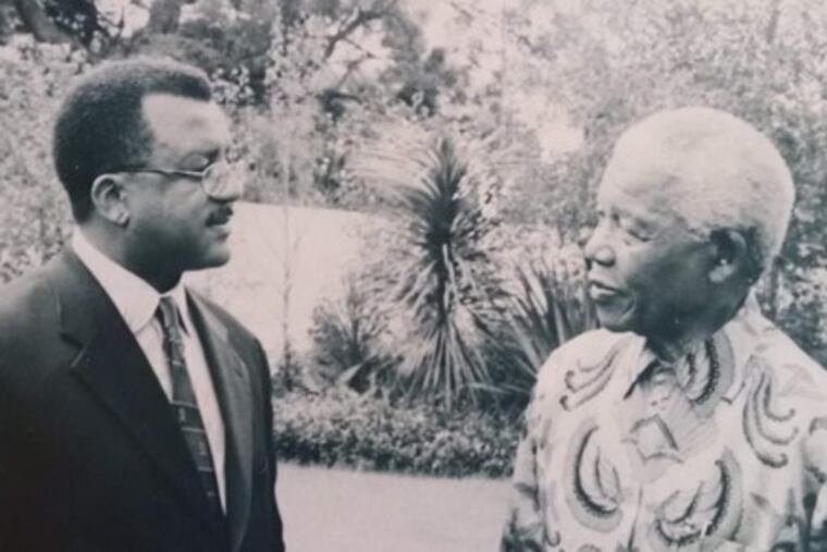 James. W. Scott Sr. with South African president Nelson Mandela. Mr. Scott advised Mandela on how to educate doctors in South Africa, and then raised funds to pay the students' tuition.