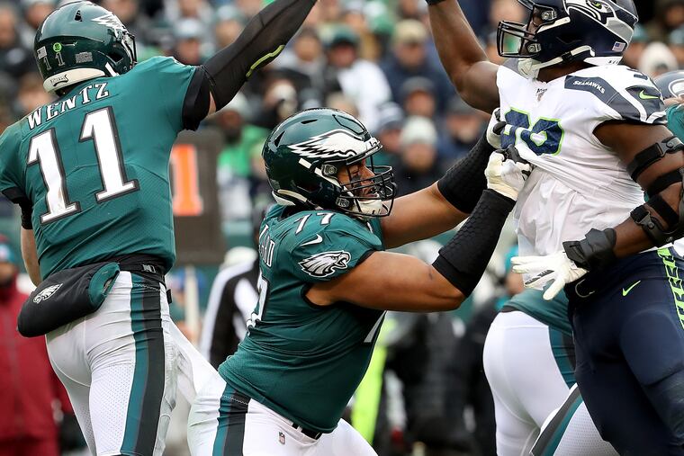 The Eagles' Andre Dillard (77) blocking Seattle's Rasheem Green, in the Eagles' loss to Seattle in November.