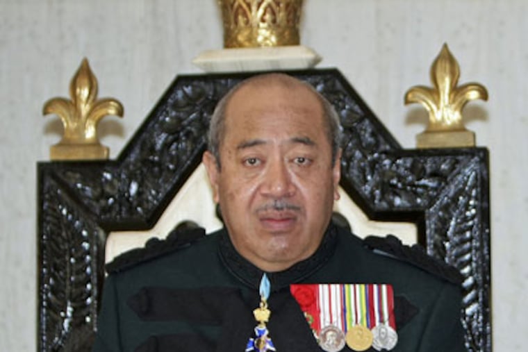 FILE - In this July 31, 2008 file photo the Tonga's monarch, King George Tupou V, sits on his throne during the Royal Honors Investiture Ceremony in Nuku'alofa, Tonga. King George Tupou V, who championed a more democratic system of government in the Pacific island nation, died Sunday March 18, 2012, at a Hong Kong hospital. (AP Photo/Torsten Blackwood, Pool, File)
