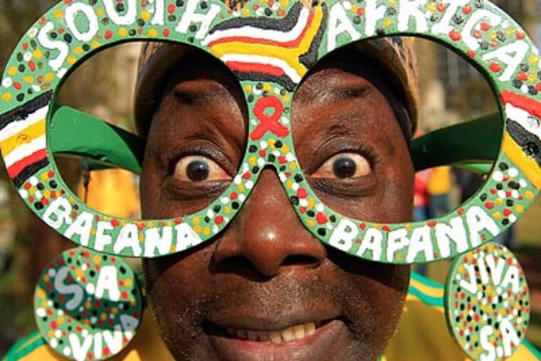 South African fans are ready for their team to play Mexico in the opening game of the World Cup. (Hassan Ammar/AP)