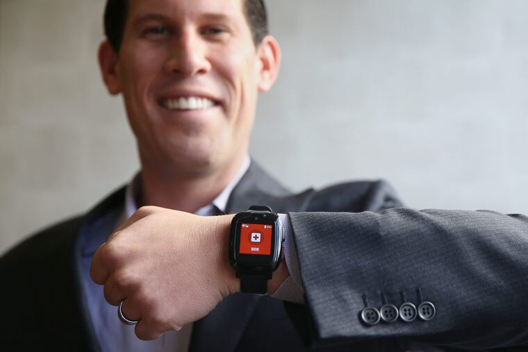 Medical Guardian founder and CEO Geoff Gross stands for a portrait with the company's Freedom Guardian smart watch for seniors, which includes medical alert features, at the company's Center City office on Wednesday, Jan. 24, 2018.