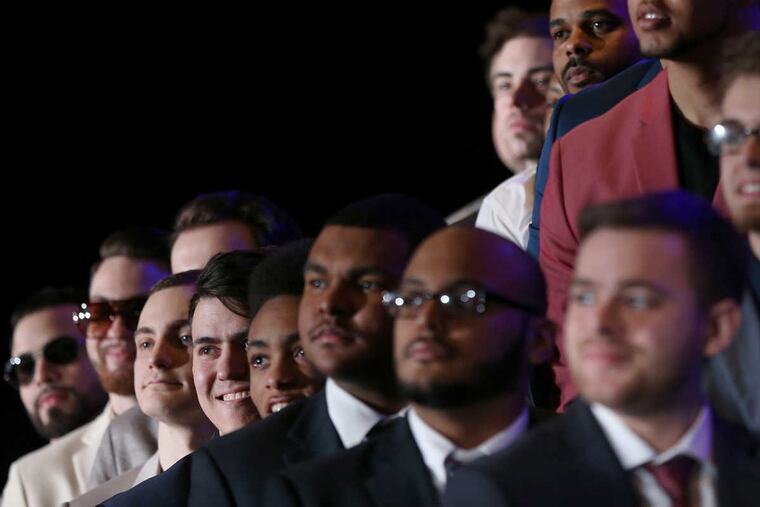Players pose for group photos before the first-ever NBA 2K draft at Madison Square Garden's Hulu Theater in New York City on Wednesday, April 4, 2018.
