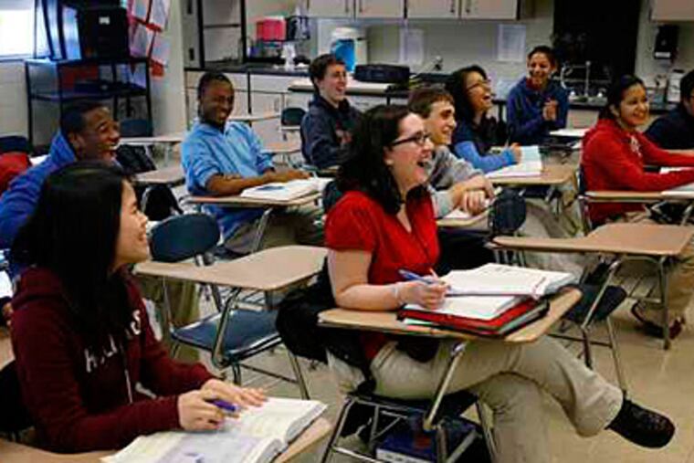 An AP Chemistry class laughs at a remark made by their teacher, Bill Snyder. Area educators have mixed views on the Obama administrations' proposed changes to the No Child Left Behind law. Michael S. Wirtz / Staff / File )