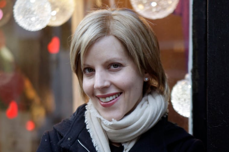 In this Feb. 7, 2012 photo, Pamela Druckerman, author of "Bringing Up Bebe," poses for a picture in New York. The just-published "Bringing Up Bebe" is written by an American who was struck by the good manners of kids in Paris, where she raises her own brood of three. Now she shares her lessons with those of us whose kids, alas, don't have quite the same je ne sais quoi. (AP Photo/Seth Wenig)