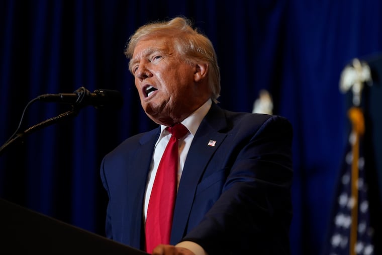 Former President Donald Trump speaks during a commit to caucus rally on Saturday in Cedar Rapids, Iowa.