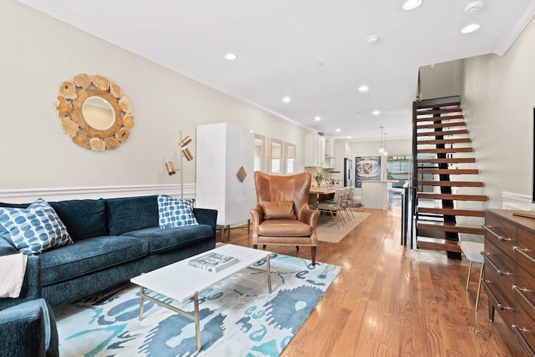 The living room of the rowhouse for sale in Bella Vista.