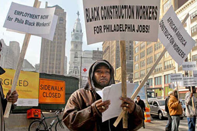 Last week, the Mayor's Advisory Commission made more than 40 recommendations that would help minority workers, like Rashime Sibert-Bey, left, and drywall contractor George Sibert, get work at construction sites.