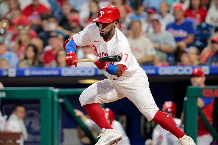 Phils Odubel Herrera lays down a perfect bunt double that knocked in two runs in the fourth inning against the Colorado Rockies on Sept. 11, 2021.