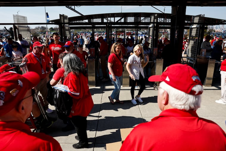 Phillies fans arrive for opening day against the Rangers at Citizens Bank Park on March 26.