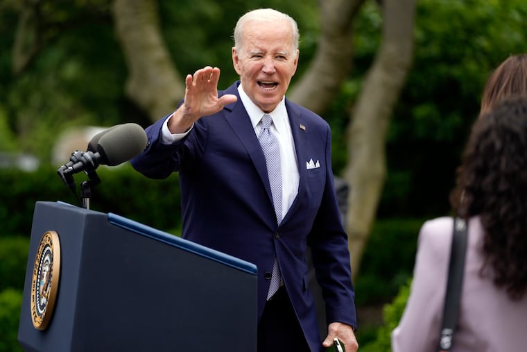 President Joe Biden waves after speaking in the Rose Garden of the White House in Washington on Monday.