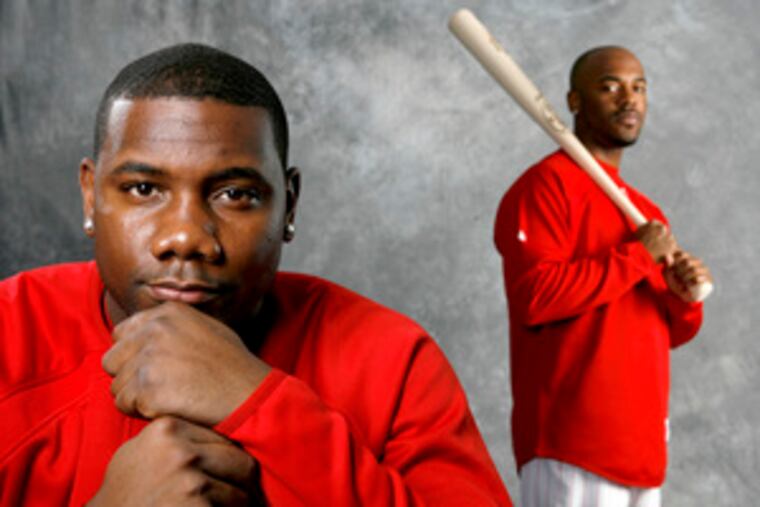 Ryan Howard (left) and Jimmy Rollins (right) are among the Phillies' African American team leaders. The Phils have come a long way since they were the last National League team to have a black player. See a slide show on the Phillies' new era at philly.com.