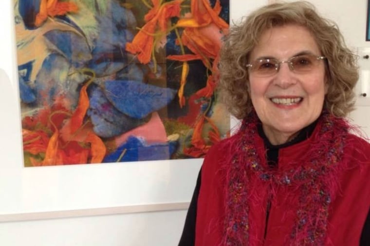 Merle Spandorfer with an example of her art.