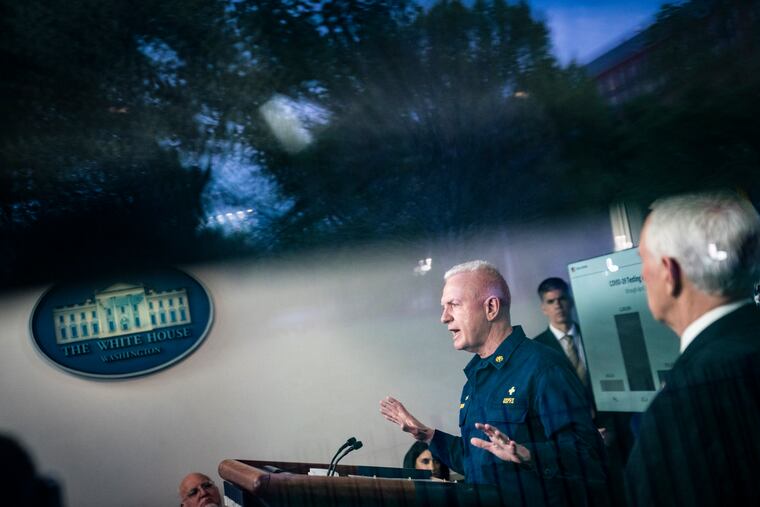 Adm. Brett Giroir, assistant secretary for health in the Department of Health and Human Services, appeared with Vice President Mike Pence and members of the coronavirus task force during a briefing on Friday.
