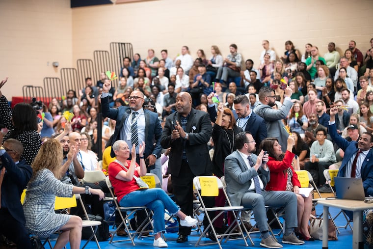 The number of newly certified teachers from Pennsylvania teacher preparation programs reached a five-year high in 2023, writes Sharif El-Mekki. Here, new hires and Philadelphia School District leadership clap during speaker addresses on the first day of new hire orientation at School of the Future in West Philadelphia on Aug. 7, 2024.