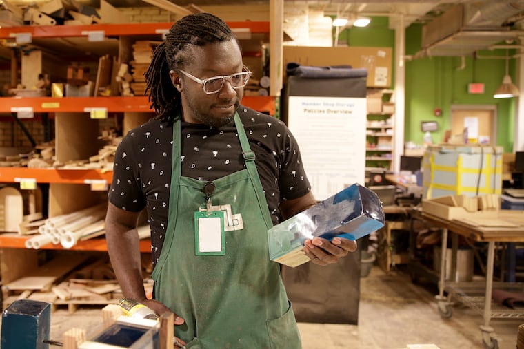 Sharif Pendleton examines the new trophy he is working on for The Barrymore Awards for Excellence in Theatre at Nextfab in on September 30, 2019.