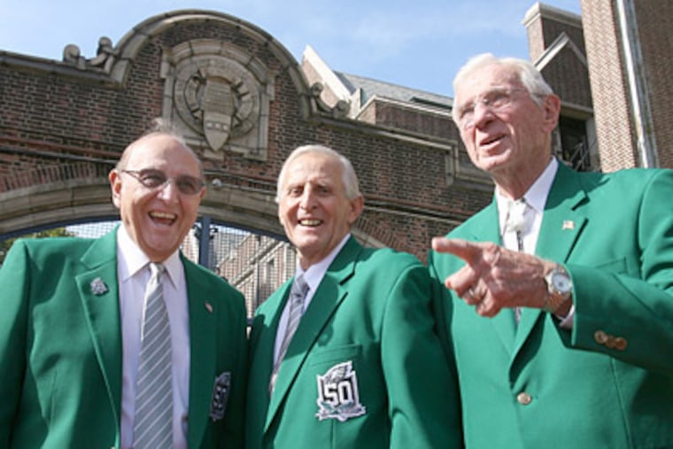 Members of the 1960 Eagles Joe Pagliei (left), Tommy McDonald, and Chuck Bednarik. (Charles Fox / Staff Photographer)