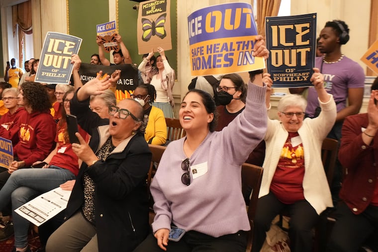 Supporters of the “ICE Out Legislation” celebrate the final passage of votes in City Council, in Philadelphia, April 23, 2026.