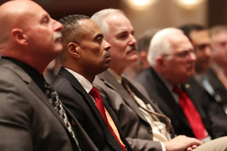 Philadelphia Police Commissioner Richard Ross listens as Attorney General Jeff Sessions addresses the Major Cities Chiefs Association fall meeting at the Pennsylvania Convention Center about Project Safe Neighborhoods and other initiatives to reduce violent crime Saturday October 21, 2017. DAVID SWANSON / Staff Photographer