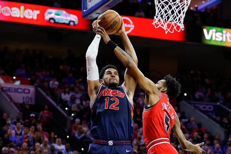 Sixers forward Tobias Harris drives to the basket against Chicago Bulls forward Derrick Jones Jr., on Monday, March 7, 2022 in Philadelphia.