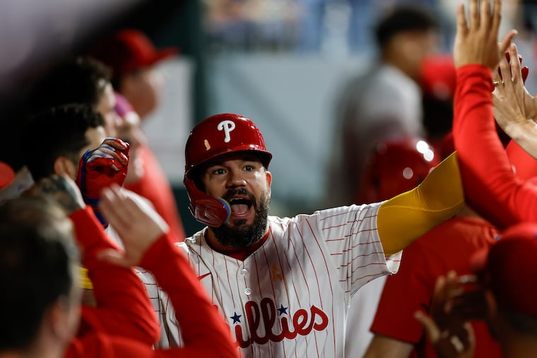 Phillies designated hitter Kyle Schwarber celebrates a fifth-inning solo home run, his 51st home run of the season in the team's win over the Royals on Sunday.