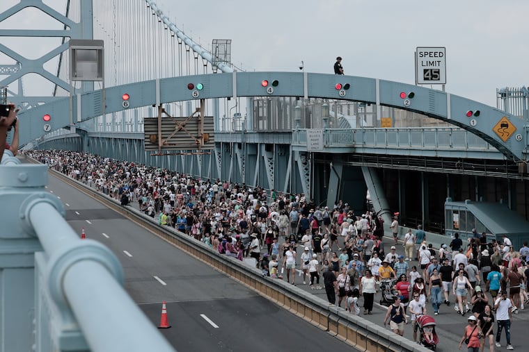 Thousands of people walked the Ben Franklin Bridge on the 100th anniversary of its opening on Saturday, July 11, 2026.