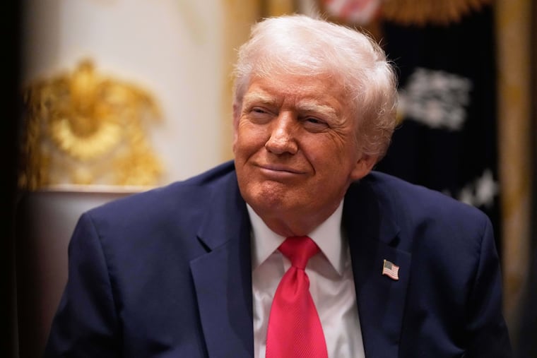 President Donald Trump listens during a cabinet meeting at the White House on Tuesday. Despite his effort to dismiss affordability concerns, many Americans now blame the president for the higher costs, writes the Editorial Board.